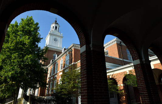 Gilman Hall viewed from one of its adjoining brick colonnades -Will Kirk 23