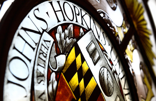 The Johns Hopkins window in Gilman Hall's Memorial Hall -Will Kirk 12